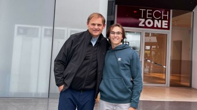 (from left) Bjørn Gulden, CEO of Adidas, with student John Linehan during Linehan's internship. Photo courtesy of John Linehan. 